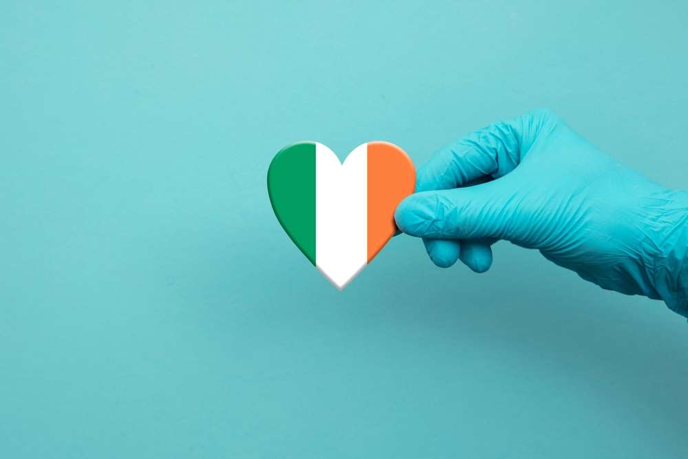 Medical,Workers,Hand,Wearing,Surgical,Glove,Holding,Ireland,Flag,Heart {{brizy_dc_image_alt entityId=